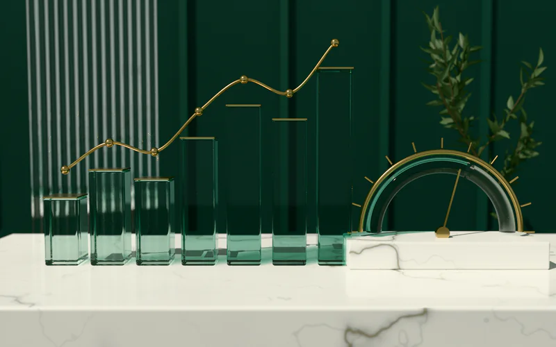 Green glass bars of rising height with a gold trend line and a gold score gauge